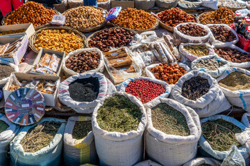 Uzbekistan, marked day beside the road, sun-dried  cheese balls are exposed for sale.