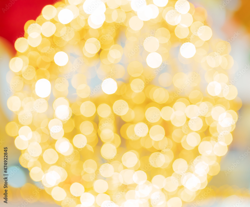Poster yellow bright round bokeh make up the shape of the ball. defocusing background image