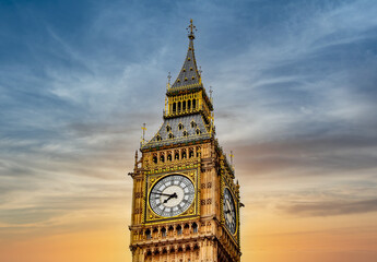 Clock of Big Ben tower at sunset, London, UK