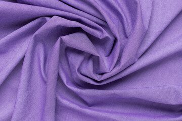 Trendy Color of the year 2022. Very Peri. violet crumpled fabric background
