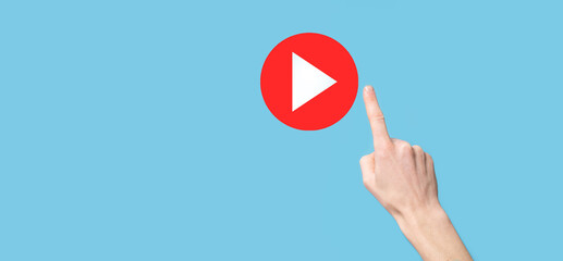Businessman pressing, hold play button sign to start or initiate projects.Video Play Presentation....