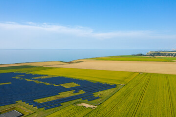 Norman Solar Panels in the beautiful countryside in Europe, France, Normandy, in summer on a sunny day.