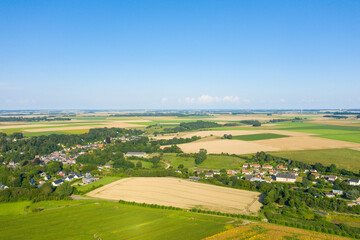 The Normandy countryside with its villages and fields in Europe, France, Normandy, in summer, on a sunny day.