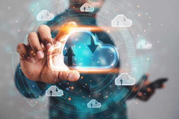 cloud business technology concept A business man shows a metaverse system cloud computing business data storage connected to the business network via wireless internet.
