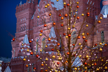 Tree painted with christmas lights. Moscow.