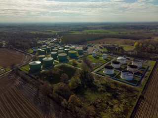 Aerial view of steel round Oil Storage Tanks, storage and handling services for petroleum products.