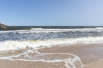 The waves in the seaside resort of Zinnowitz on the island of Usedom surround the great pier