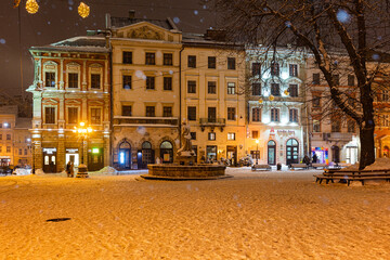 Fototapeta na wymiar Market square in Lviv in winter at night