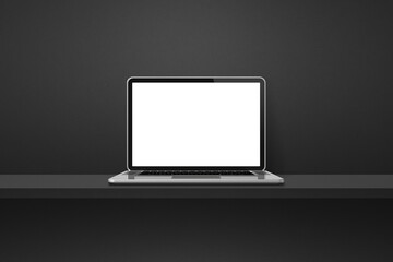 Laptop computer on black shelf background