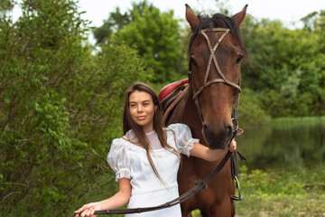 Walk with a horse near the river