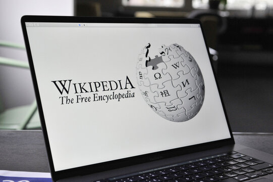 Hamburg, Germany - January 15, 2021: Close up of Wikipedia logo on a MacBook Pro display - Wikipedia is a free encyclopedia created and edited by volunteers around the world