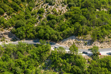 Fototapeta na wymiar The Routes des Gorges du Verdon surrounded by lush green vegetation in Europe, France, Provence Alpes Cote dAzur, Var, in summer, on a sunny day.