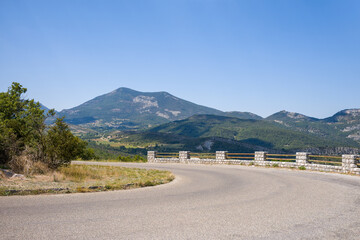 A bend on a road in the Gorges du Verdon in Europe, France, Provence Alpes Cote dAzur, in the Var,...