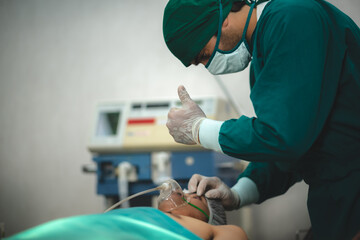 Anesthetist surgery doctor professional team are working in hospital operating room