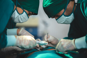 Anesthetist surgery doctor professional team are working in hospital operating room