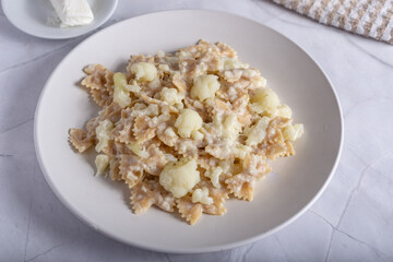 Pasta with cauliflower and goat cheese.