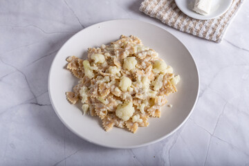Pasta with cauliflower and goat cheese.