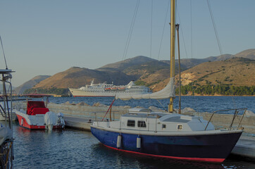 Small classic white cruiseship or cruise ship liner Ocean Majesty of Majestic Cruises on blue sea...