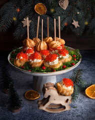 christmas snack cakes with caviar for a buffet. Christmas food - 474937600