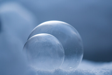 frozen soap bubble at a cold morning in the cold light