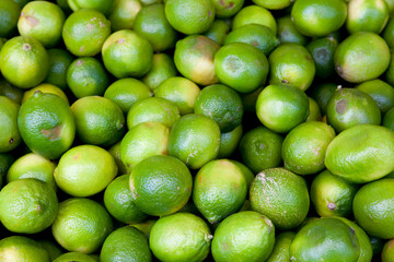 Pile of lemons in a farmer's market.