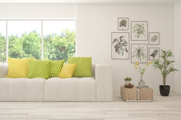 Minimalist living room in white color with sofa and summer landscape in window. Scandinavian interior design. 3D illustration