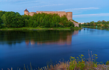 Naklejka na ściany i meble View of Ivangorod Castle in Russia from Estonia.