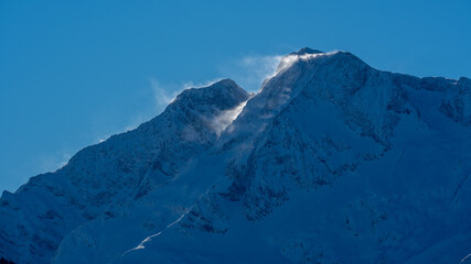 beautiful view of the snow capped hohe tauern in austria at a sunny  winter day