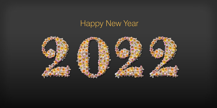 Bonne année 2022 - Lettres remplies de fleurs multicolores, entourées de fleurs détourées sur fond noir