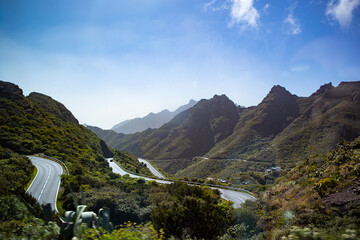 Fototapeta na wymiar Green mountains with serpantine road in Tenerife Canary island, Spain