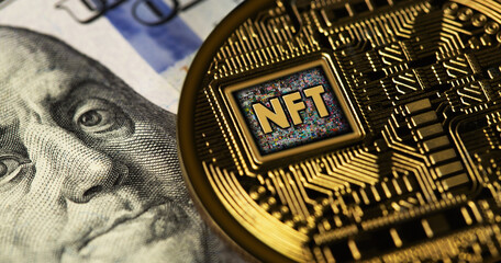 NFT with dollar money closeup. Non fungible tokens are unique tokens or digital assets that...