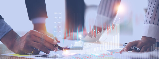 Team work with business analytic price chart on the table at the conference room.