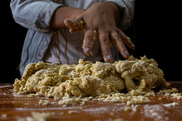 kneading hands to be able to make pasta with all the dough in the fingers