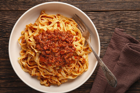 Close-up plate of pasta tagliatelle with BOLOGNESE SAUCE