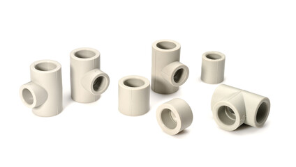 Various plastic fittings for polypropylene pipes on a white background