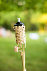 Wood Tiki Torch Outside Day Time