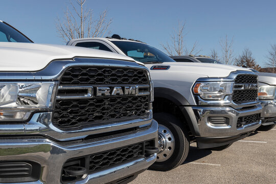 Ram 5500 Heavy Duty Chassis Cab on display at a Stellantis Ram dealership. The Ram 5500 is available as a Tradesman or XLT model.