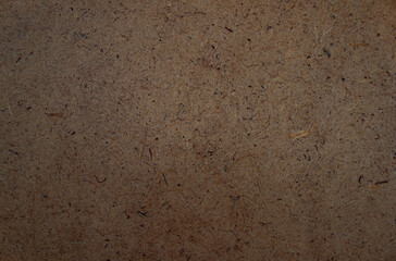 Brown plywood background texture close up. Thin board