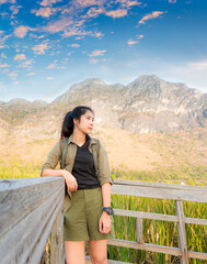 Naklejka premium Hiking. Asian female hikers carry heavy backpacking on hiking trails. Live a healthy life 