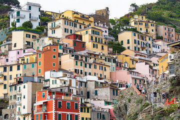 Fototapeta na wymiar Traditional Italian architecture, colorful houses on the hills in Vernazza, Italian Riviera, Cinque Terre, Liguria, Italy