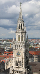Fototapeta na wymiar tower with clock of the town hall of the city of Munich in Germany