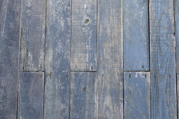 Wood background or dark brown texture. Texture of old wood use as natural background. Top view of brown black american walnut wood paneling. Copy space.