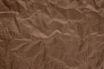 crumpled paper.sheet of brown cardboard paper. detailed high resolution texture. abstract...