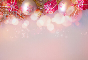 Beautiful festive theme for Christmas in rose gold colors on a bokeh background