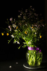 A bouquet of wild flowers in low key	