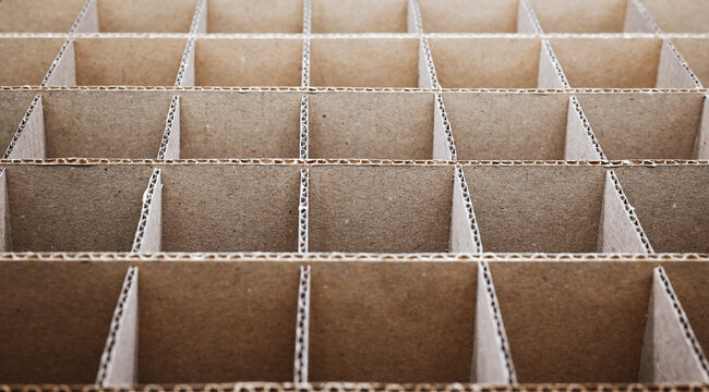 Abstract background. Square cardboard partitions close-up. Partitions for transporting fragile glass items.