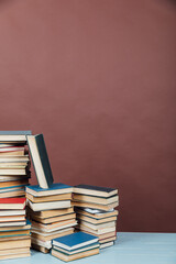 Stacks of Books for College School Library Training Brown Background