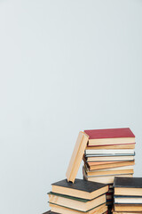Stacks of books for teaching knowledge of the college school library white background