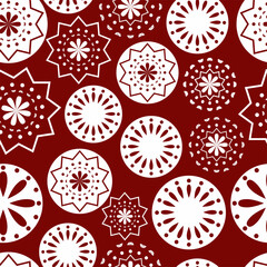 Vector illustration. Merry Christmas and Happy New Year seamless pattern. Lace background with round abstract snowflakes. Perforated bright patterns Papel Picado pattern.