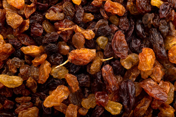 Raisin. Background of dried grapes berries with seeds close up